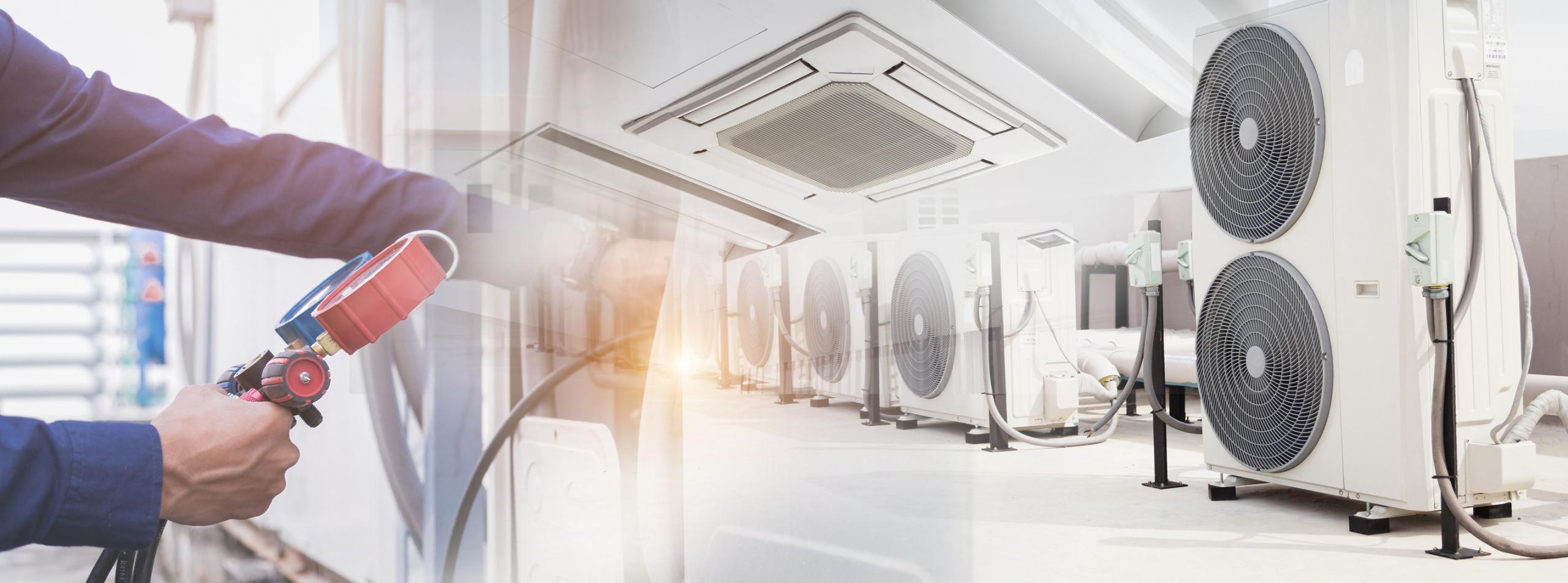 Image of an HVAC technician servicing an air conditioning unit. The image features an array of rooftop fancoils and a ceiling-mounted indoor unit. The technician is seen adjusting the equipment to ensure optimal performance and efficiency.